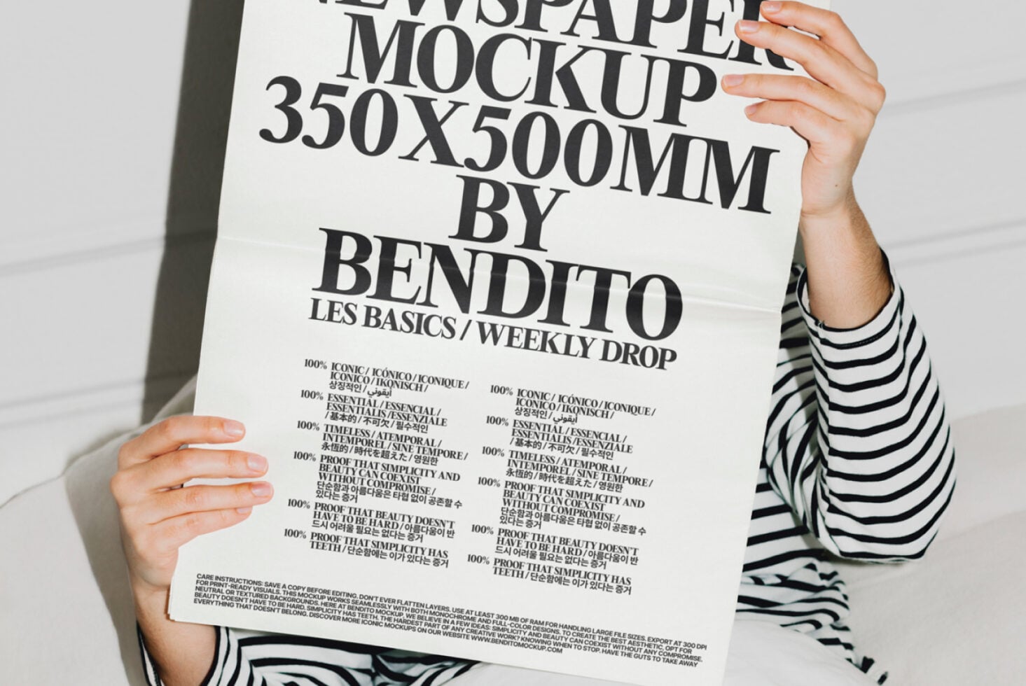 Hands holding cream newspaper mockup with multilingual text layout