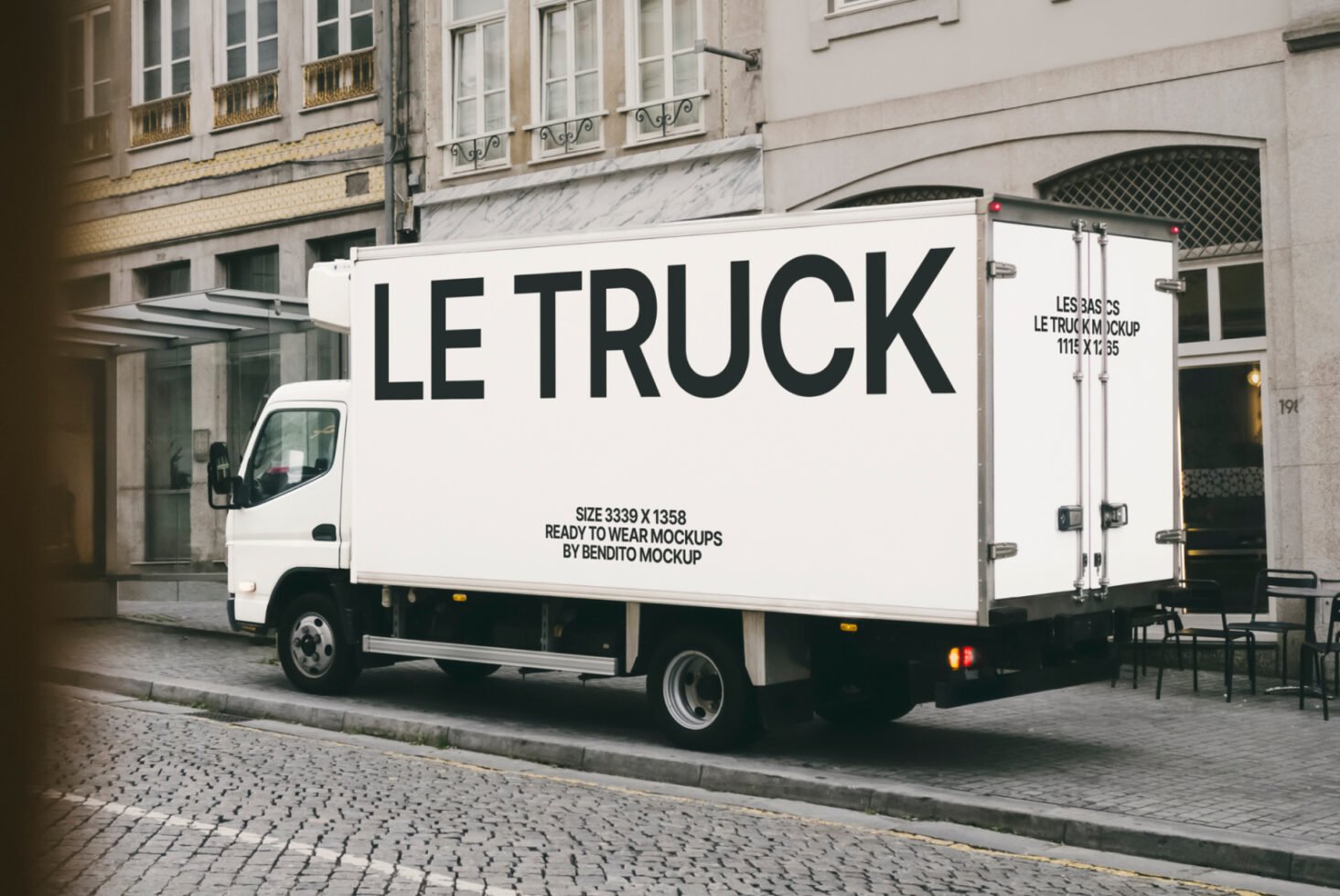 Box truck mockup on city street for graphic designers urban ad design template showcasing branding realistic vehicle side view photo mockup high quality