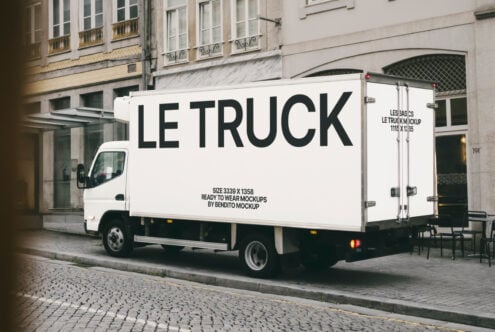 Box truck mockup on city street for graphic designers urban ad design template showcasing branding realistic vehicle side view photo mockup high quality