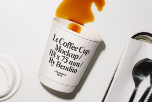 Coffee cup mockup with text detail and spilled drink 118 x 75 mm ideal for designers seeking realistic presentation for branding projects and templates.