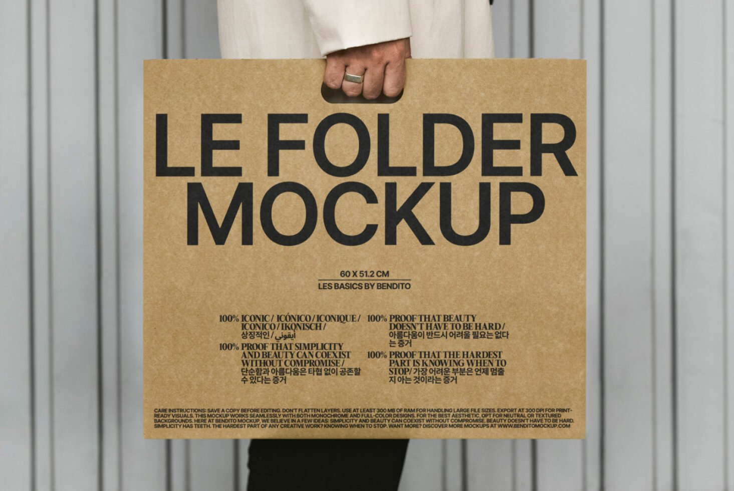Hand holding a large kraft folder with LE FOLDER MOCKUP text in bold black. Perfect for showcasing design layouts templates or branding presentations.