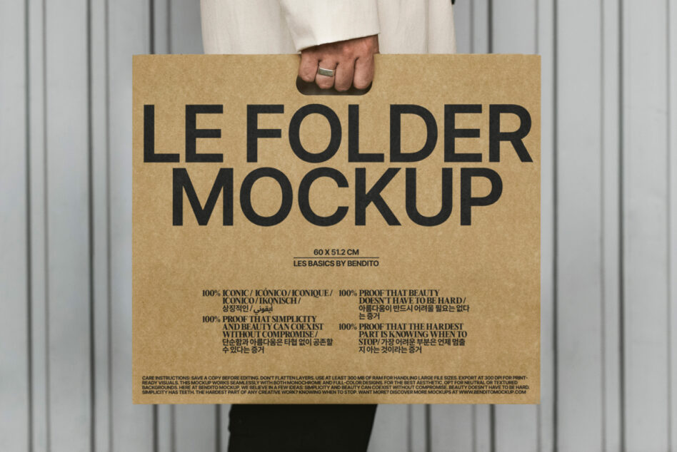 Person in cream coat holding kraft folder mockup against corrugated backdrop