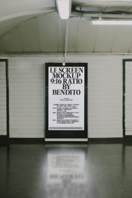 White poster mockup on subway wall displaying bold serif title with multilingual body copy