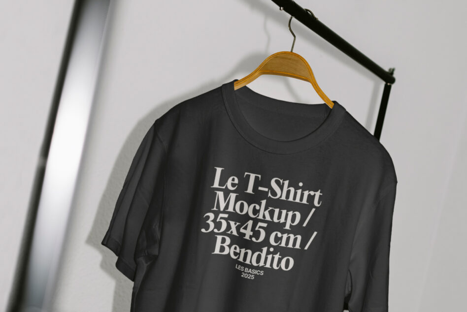 Dark crewneck tee with bold white serif type treatment