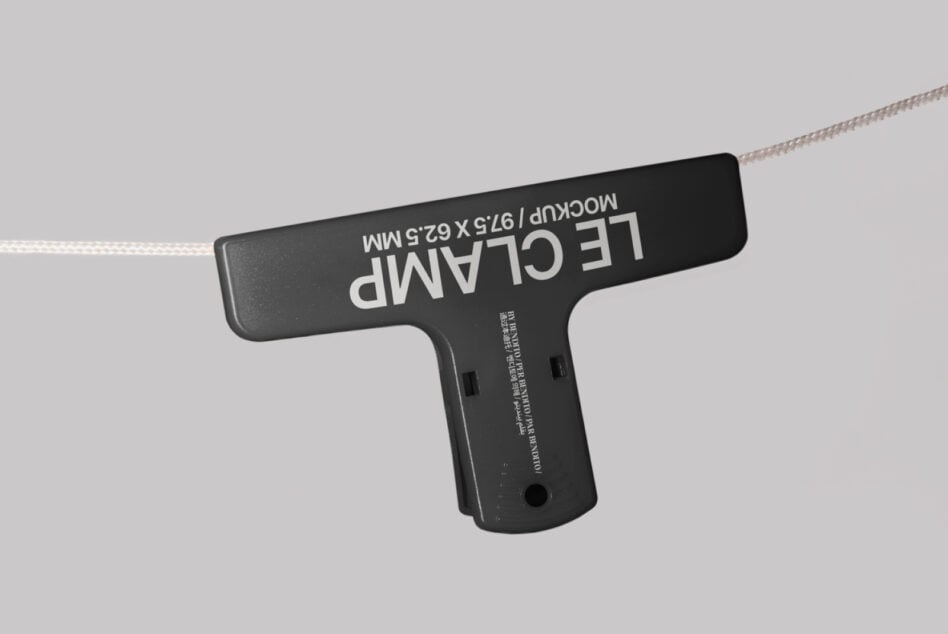 Dark gray T-shaped tag with white text hanging horizontally on cord