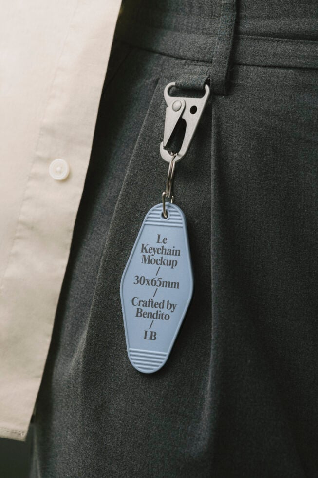 Keychain mockup attached to trousers showcasing design details. Ideal for branding presentations. Perfect for graphic designers seeking unique templates.