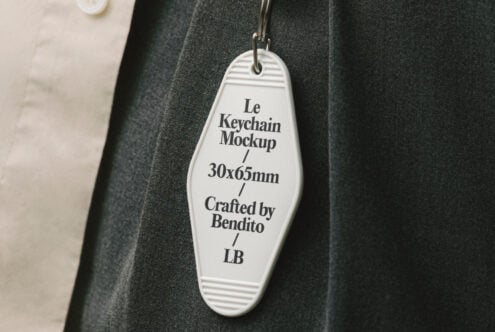 Keychain mockup displayed on fabric background with dimensions 30x65mm Crafted by Bendito ideal for designers using graphic templates and mockups