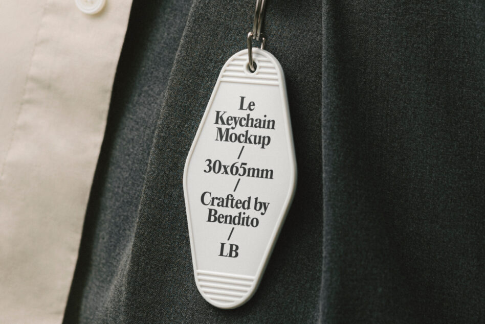 Close up of cream motel keychain mockup with striped detail