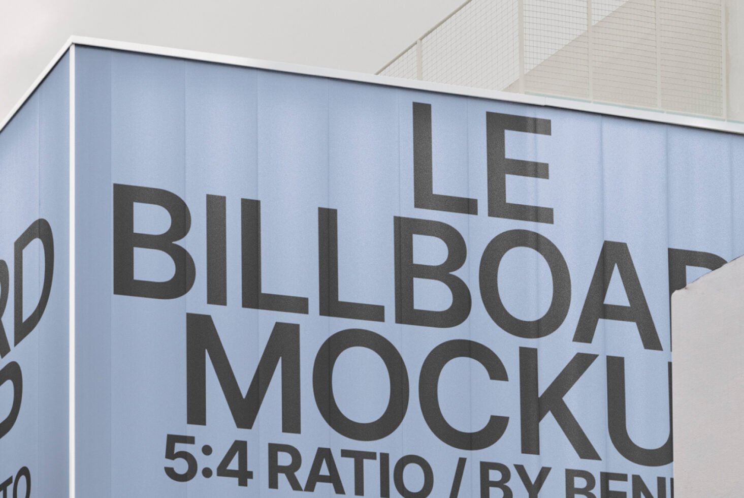 Outdoor billboard mockup with a 5:4 aspect ratio on a building. Perfect for advertising design presentations. Ideal for graphic designers.