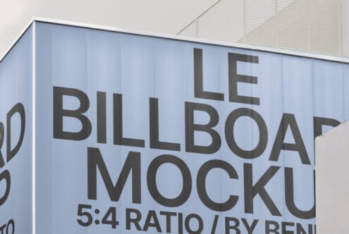 Outdoor billboard mockup with a 5:4 aspect ratio on a building. Perfect for advertising design presentations. Ideal for graphic designers.