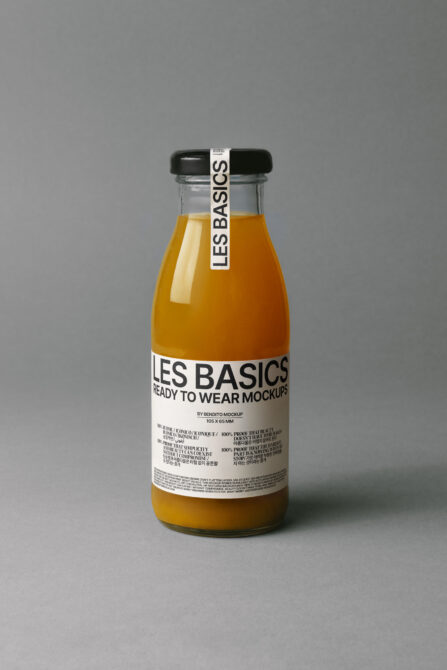 Glass beverage bottle mockup with customizable label design