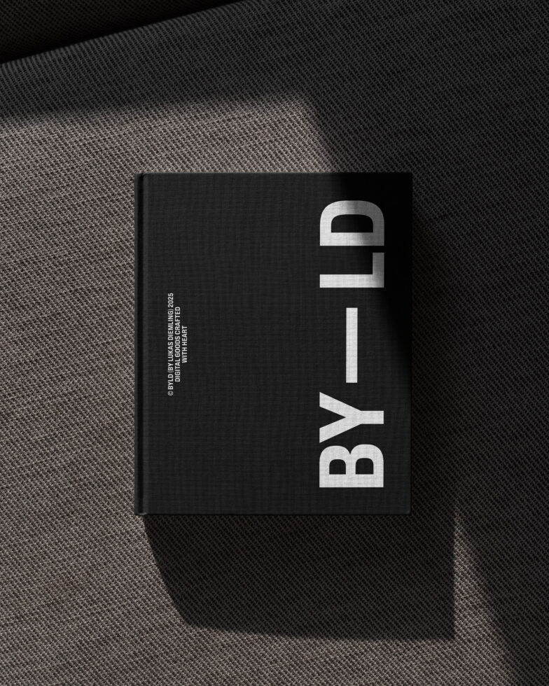 Minimalist black book cover mockup on textured fabric showcasing typography design. Perfect for designers seeking sleek, modern templates and graphics.