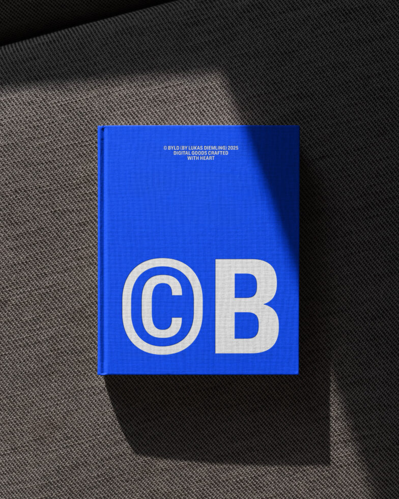 Blue hardcover book mockup on textured surface with bold white letters CB. Ideal for showcasing designs. Perfect for graphics and templates.