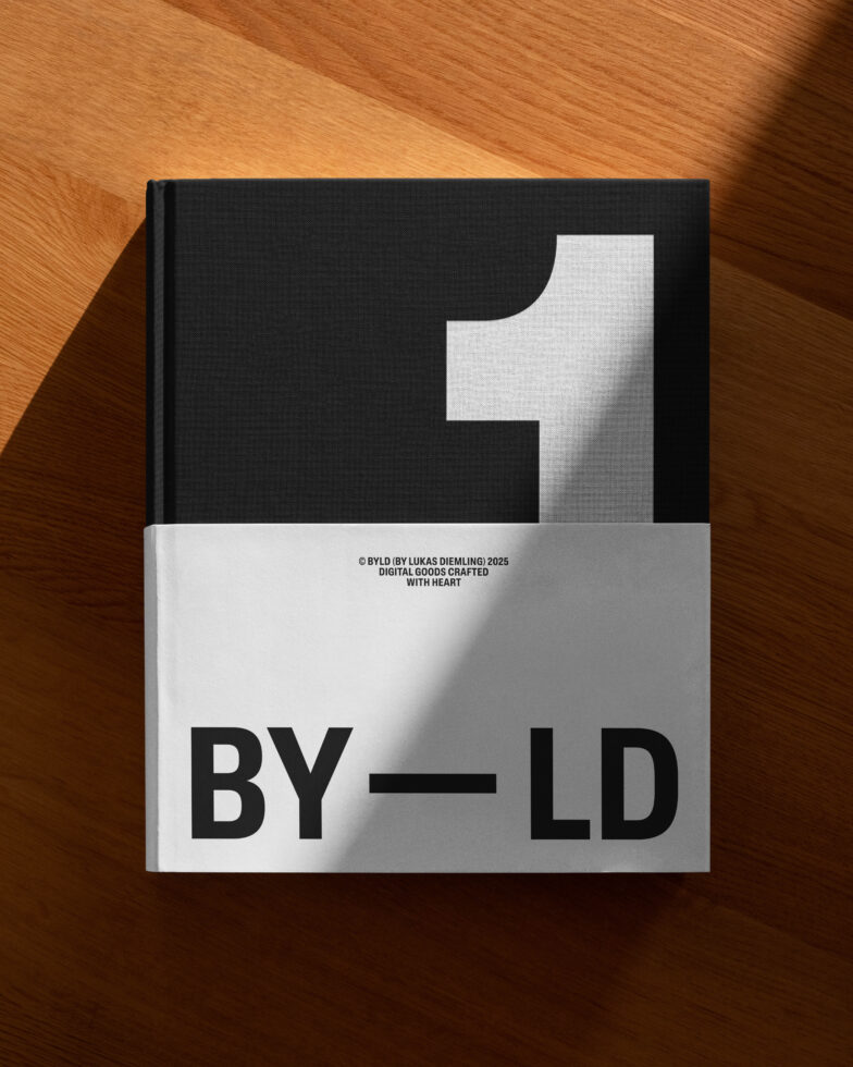 Hardcover book mockup on wooden surface featuring minimalist black and white design with large number one and BY-LD text ideal for graphic templates