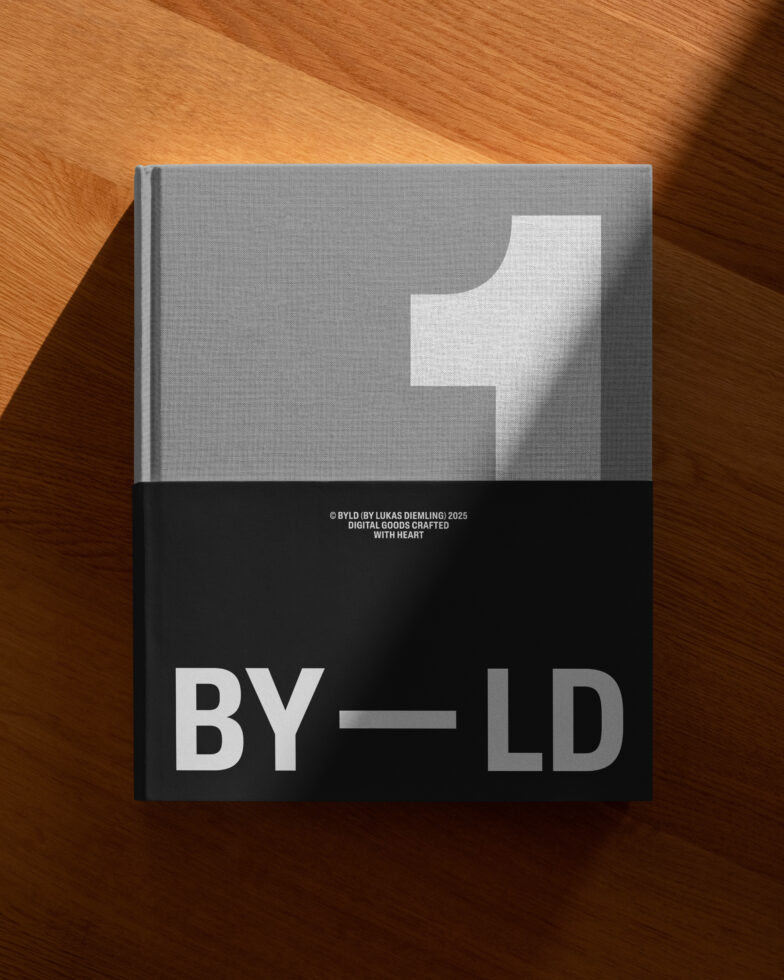 Hardcover book mockup on wooden surface featuring minimalist design large number one and bold text BYLD perfect for designers presentation realism