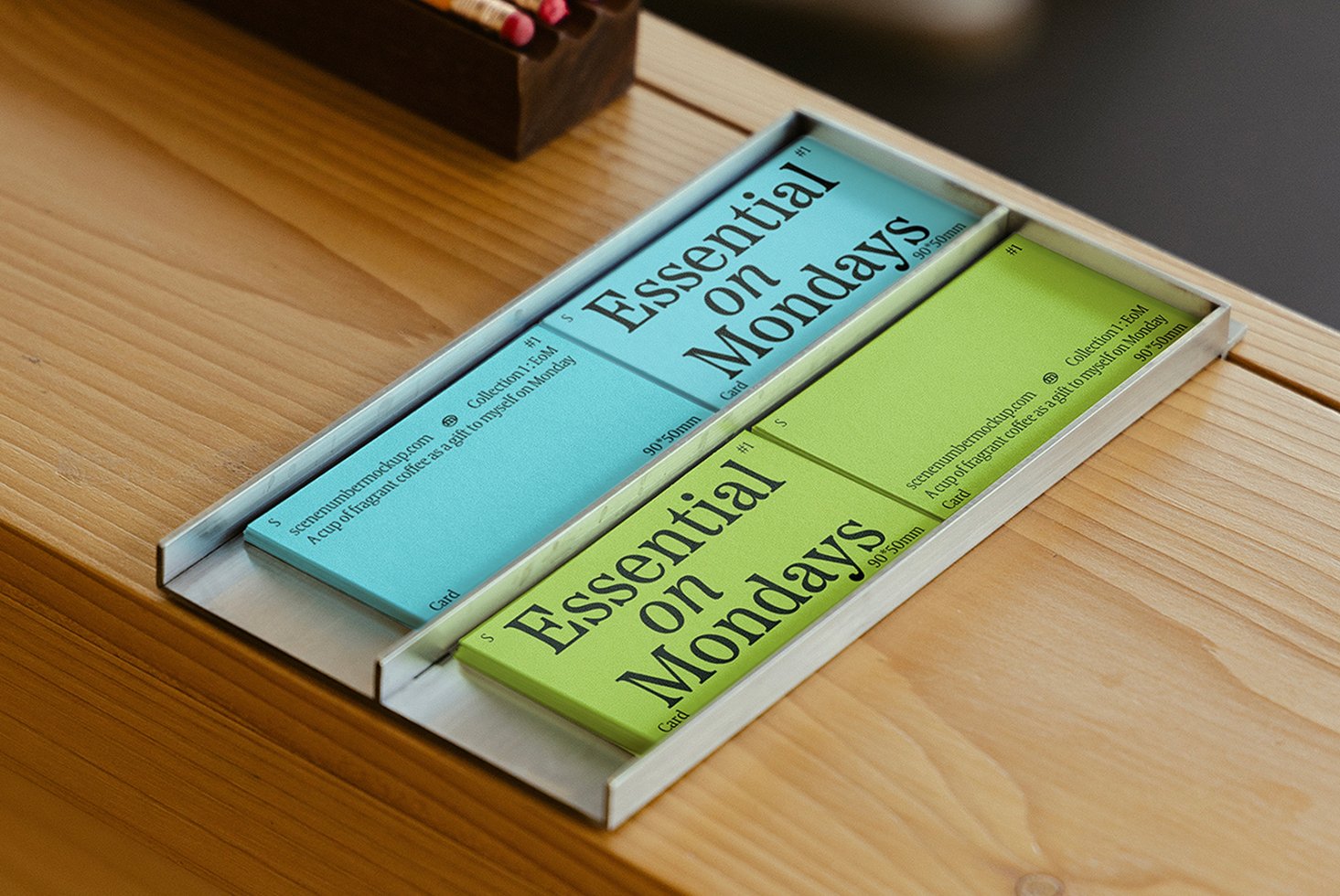 Essential on Mondays card mockups on a wooden table showcasing creative layout design ideal for designers seeking unique templates and graphics assets