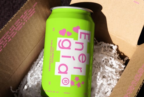 Bright green can design with pink text and heart graphics in cardboard packaging. Ideal for mockup templates and graphic design projects.