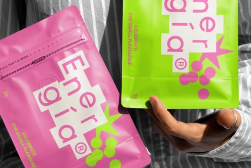 Colorful packaging mockup featuring pink and green pouches with bold typography for product design showcase ideal for graphic designers seeking vibrant visuals.