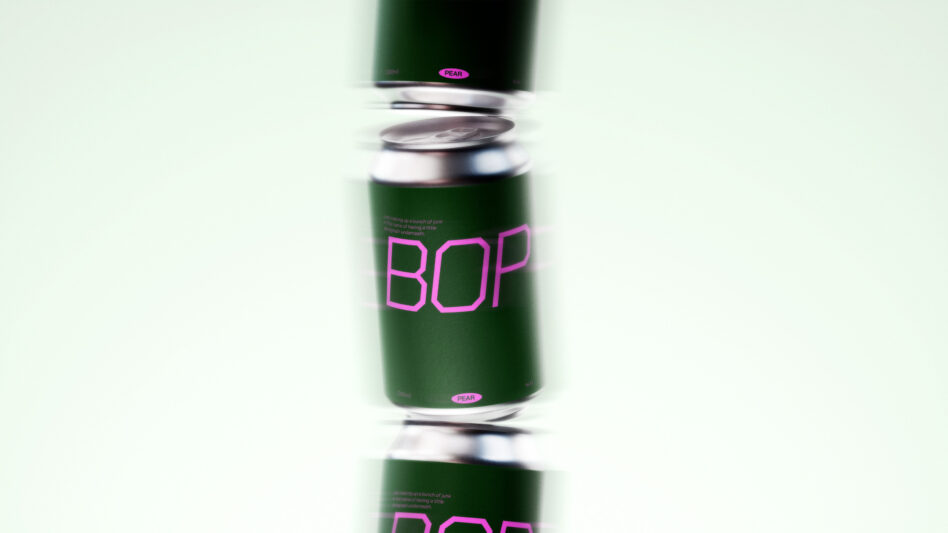 Stacked green cans with magenta BOP branding, lids exploding upward with motion blur