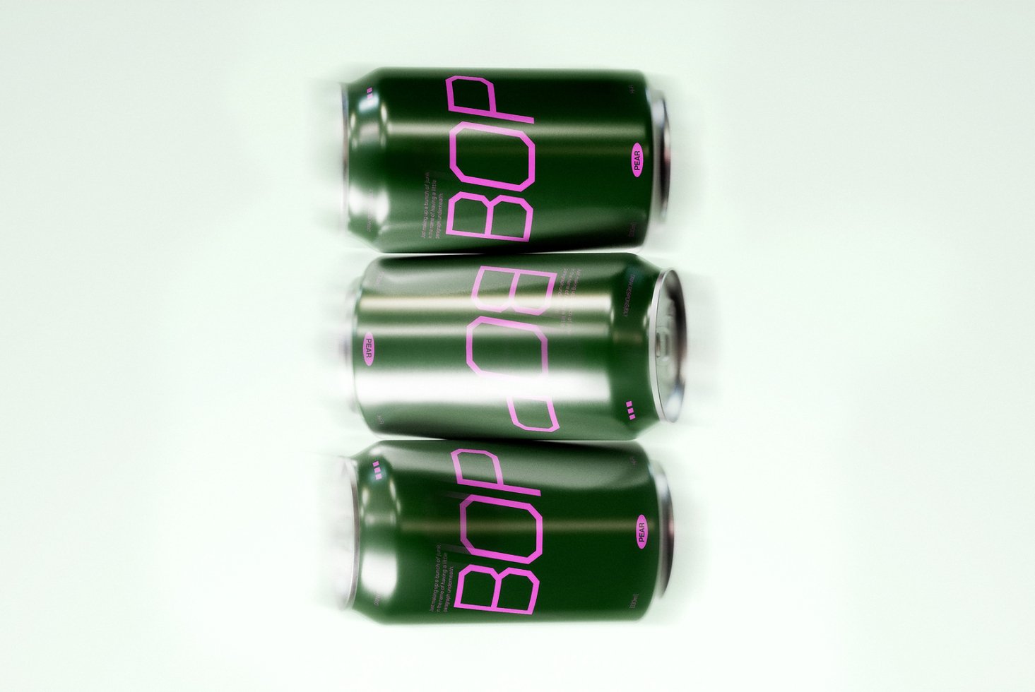 Mockup of three soda cans design. Green aluminum cans with bold pink typography arranged neatly for digital asset preview. Ideal for designers.