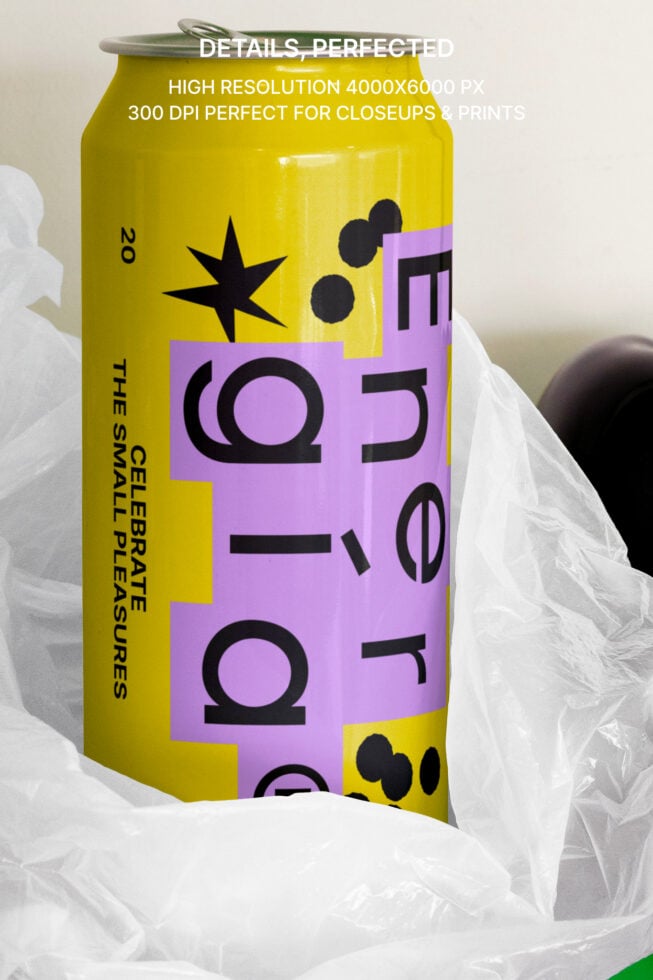 Yellow energy drink can with purple modern typography close-up, ideal mockup for designers, high resolution graphics, perfect for branding projects.