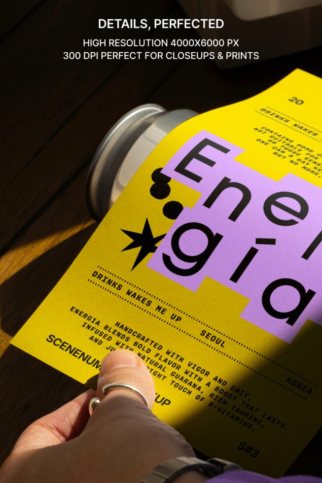 Closeup of a vibrant product label design featuring bold yellow and purple colors on a can. Ideal for mockup usage in branding and packaging projects.
