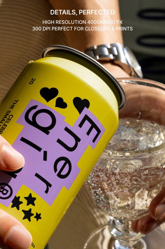 Close-up mockup of a hand holding a vibrant energy drink can with modern typography and symbols perfect for design projects and branding presentations.