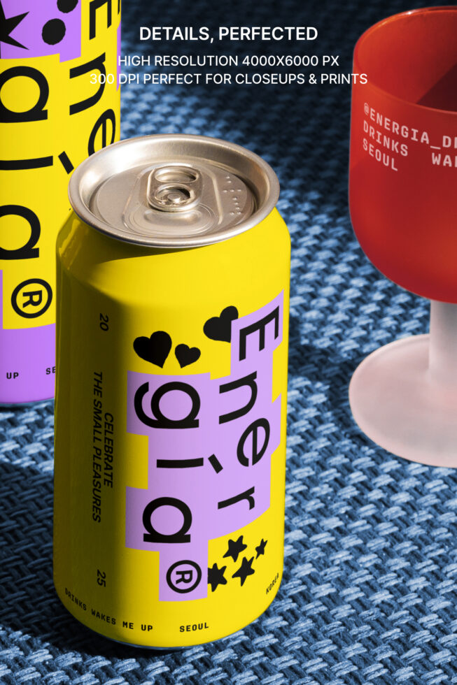 Energia drinks can mockup with vibrant yellow and purple design on woven texture background. High-resolution photo ideal for print and branding projects.