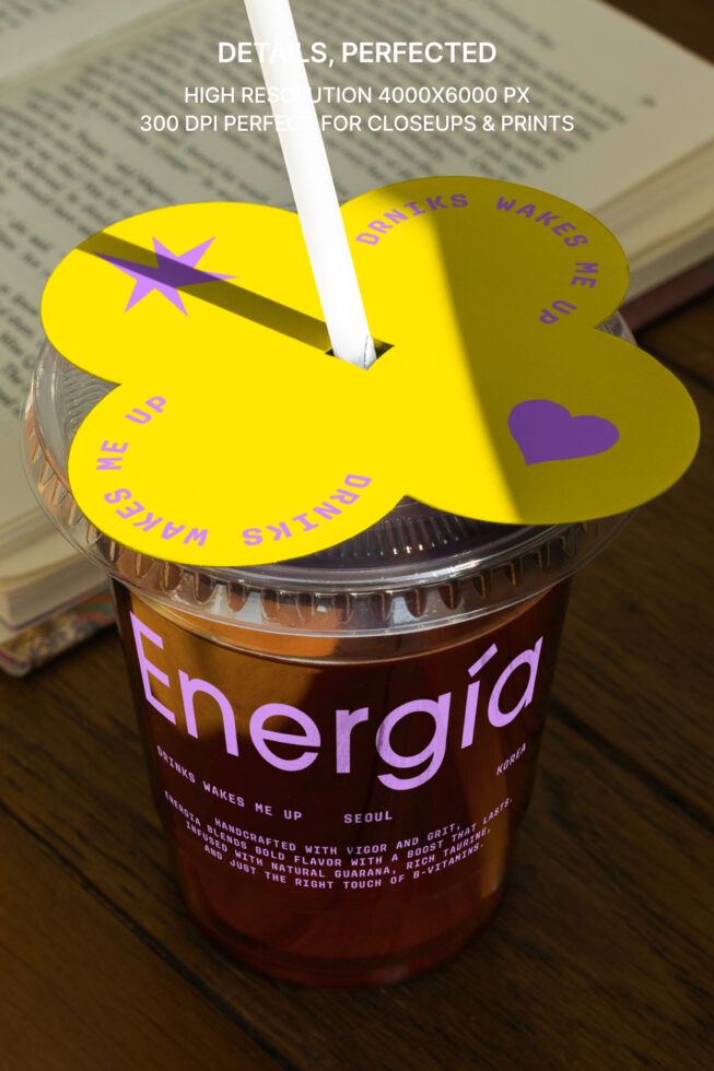 High-resolution mockup of a branded takeaway drink cup with a bright yellow lid and straw. Ideal for designers needing graphic packaging templates.
