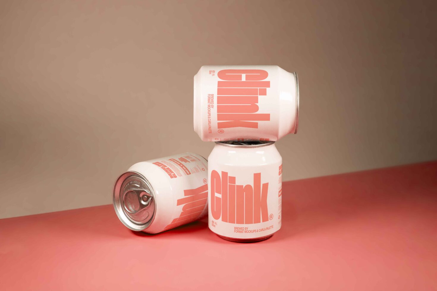 Three stacked soda can mockups with minimal design in pink and white on a pink surface ideal for branding and packaging presentations for designers.