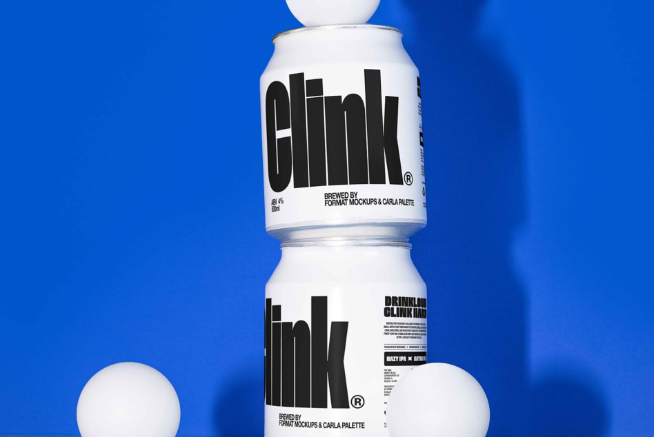 Bold black striped cans stacked tall with spheres on bright blue