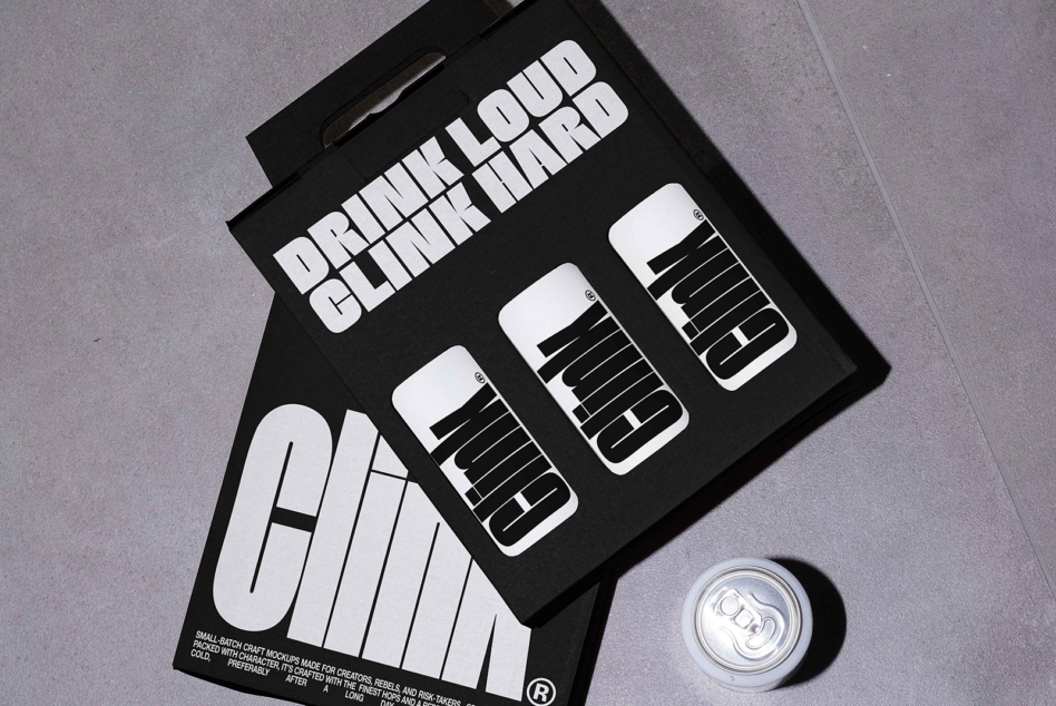 Black box showing drink loud clink hard mockup collection with three white cans plus one loose can