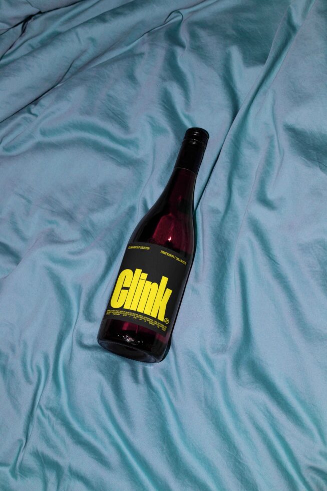 Wine bottle mockup on blue fabric background perfect for designers digital assets marketing keywords mockup design template branding visuals