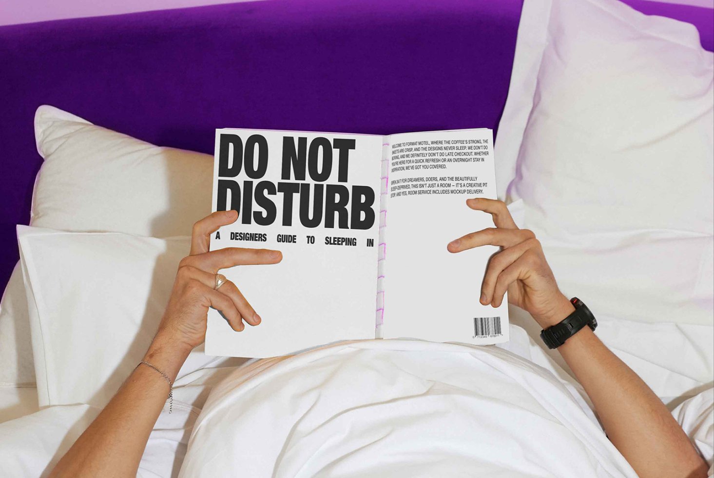 Designer reading Do Not Disturb book in bed with purple headboard and white pillows SEO keywords: mockup template font design guide sleeping creativity