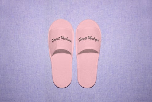 Pink sandal mockup with text Format Mockups on a purple textured background. Ideal for designers seeking footwear graphics mockups for branding projects.
