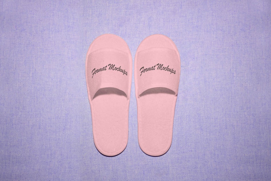 Pink slippers with cursive Format Mockups text on purple background