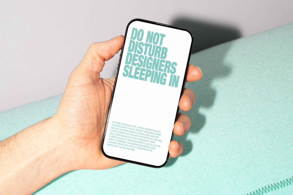 Hand holding phone with mint text on white screen, body text below headline