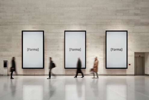 Modern gallery interior showcasing three large vertical posters on a neutral wall. Minimalist design mockup perfect for advertising or branding presentations.