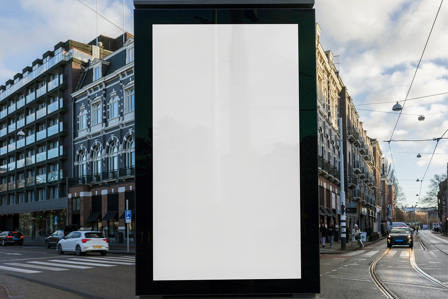 Urban street scene with a large blank billboard for mockup template display. Perfect for showcasing outdoor advertising designs in a bustling city setting.