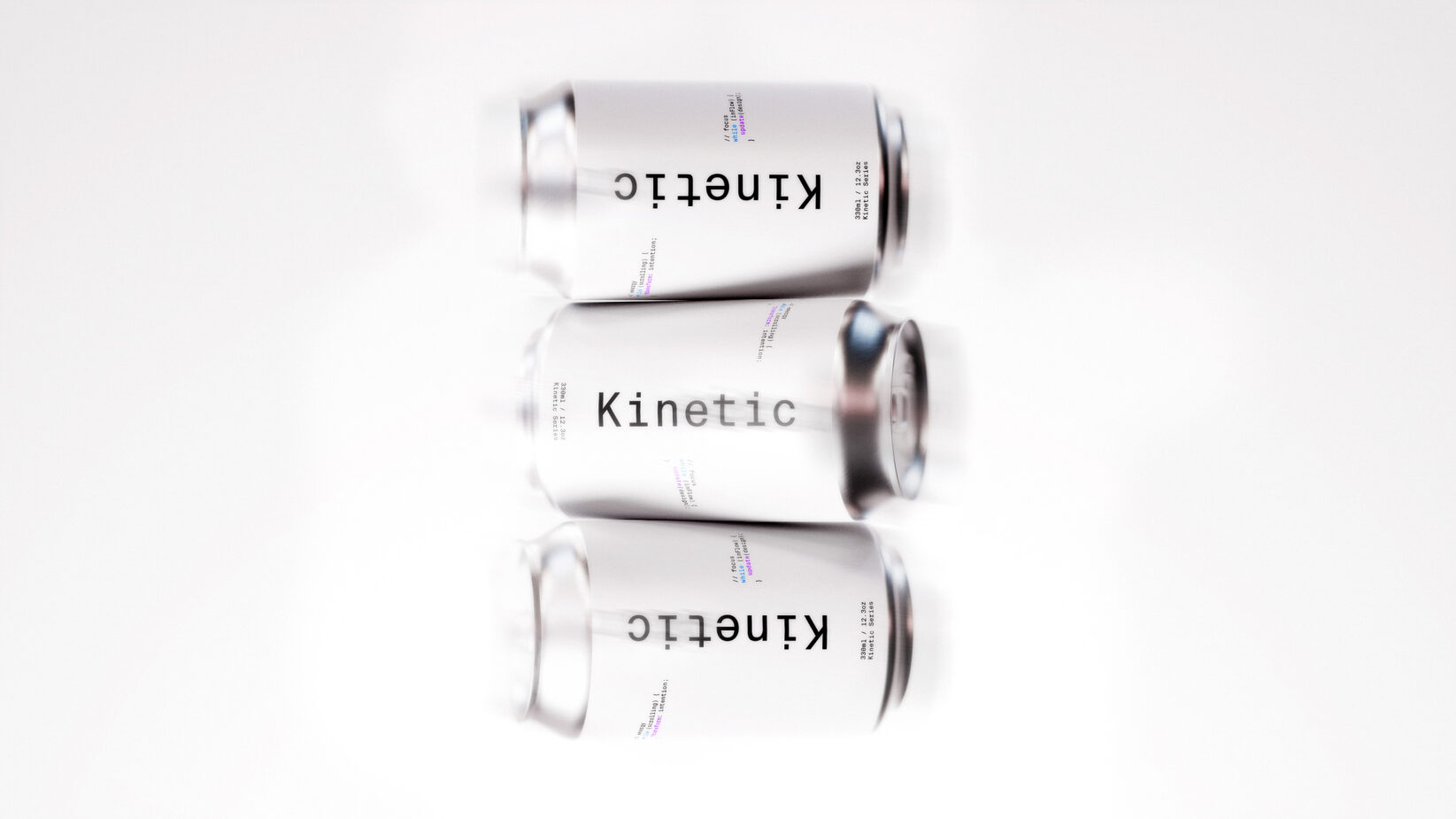 Three silver cans labeled Kinetic horizontally aligned on a white background suitable for mockup designs packaging templates or branding projects.