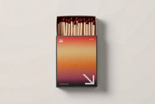 Open matchbox with red tipped matches against a gradient backdrop; ideal for graphics or mockup design projects. Keywords: mockup, template, design.