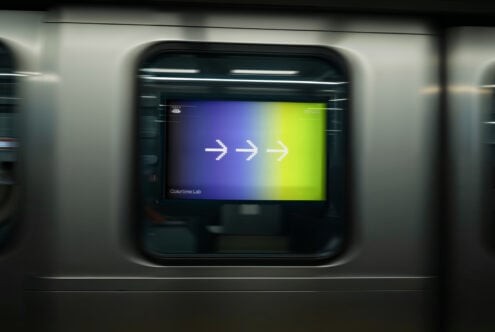 Subway mockup with digital screen displaying gradient design and arrows in motion blur ideal for presentations showcasing transportation concepts.