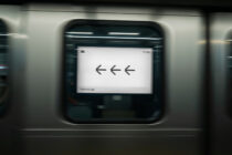 Retro monitor displaying three left arrow icons on white screen