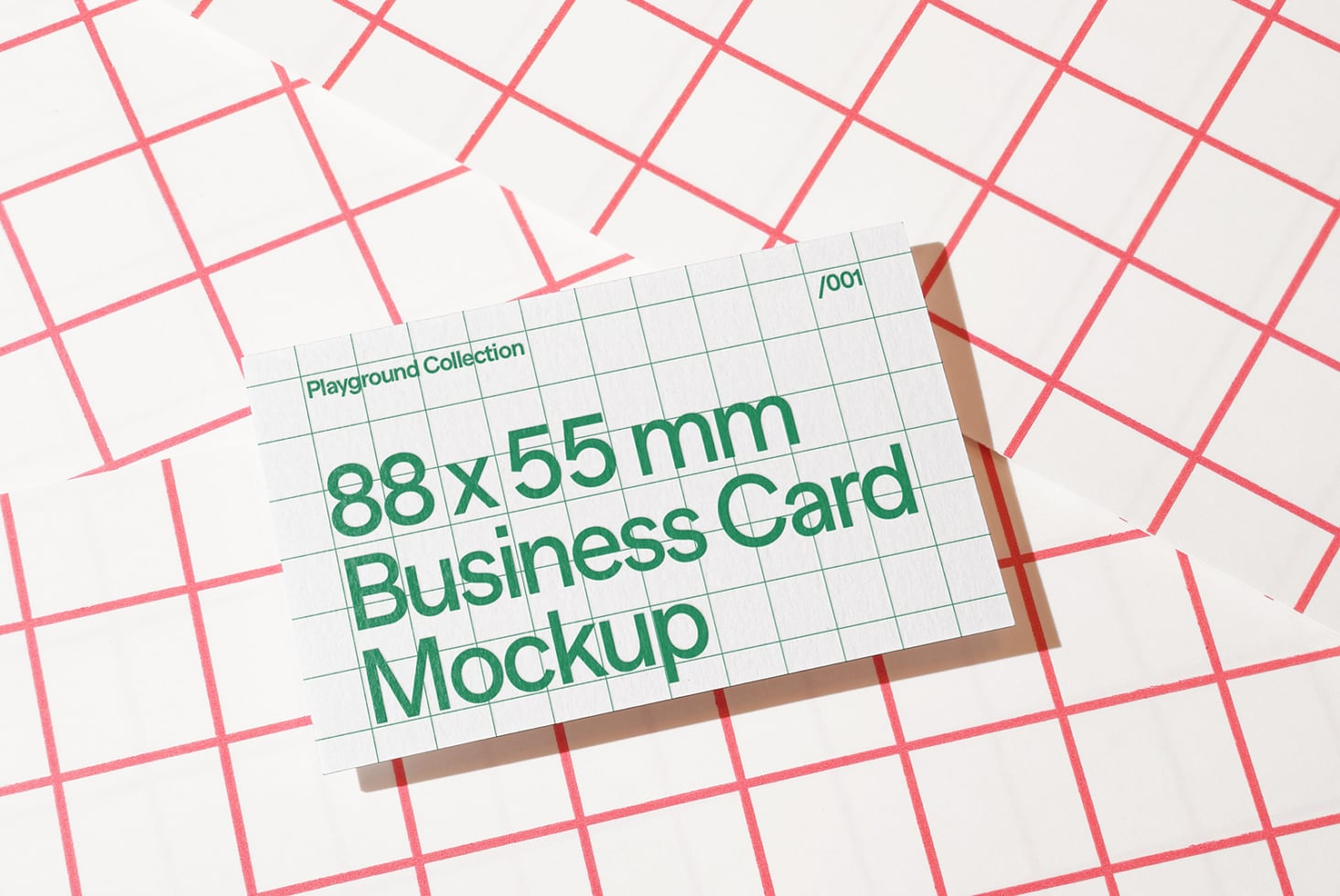 Business card mockup with green text on grid pattern, brown shadow