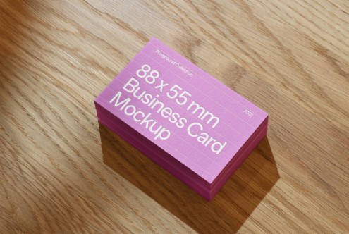 Stack of purple business cards mockup on wooden surface, 88x55mm size, ideal for graphic design, templates, branding, and print presentations.