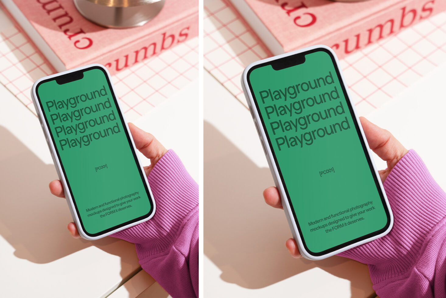 Person holding smartphone displaying green screen with Playground text, positioned above checkered surface and red book. Ideal for mockup designers.