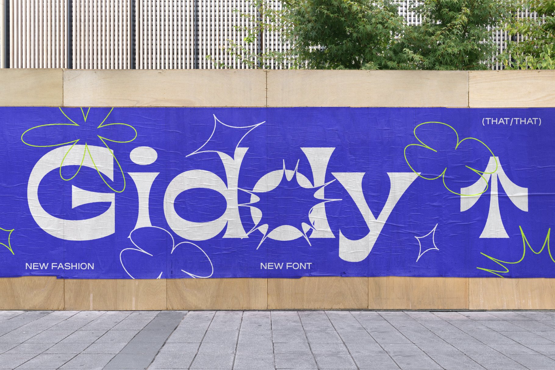 Bright blue mural showing oversized Gioia font with decorative line elements, new fashion new font text