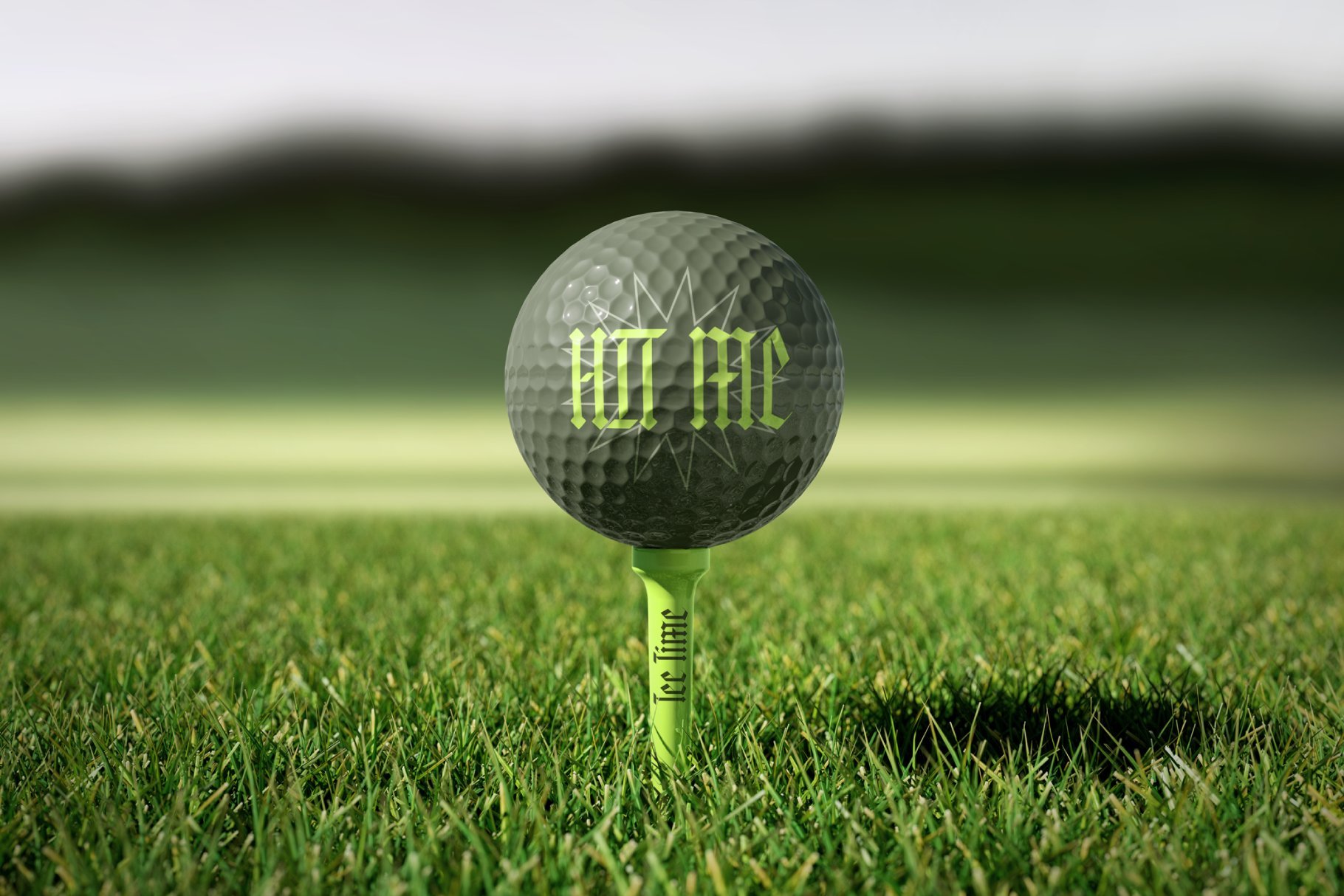 Golf ball mockup on a tee with decorative text on grass background ideal for designers creating sports graphics and templates.