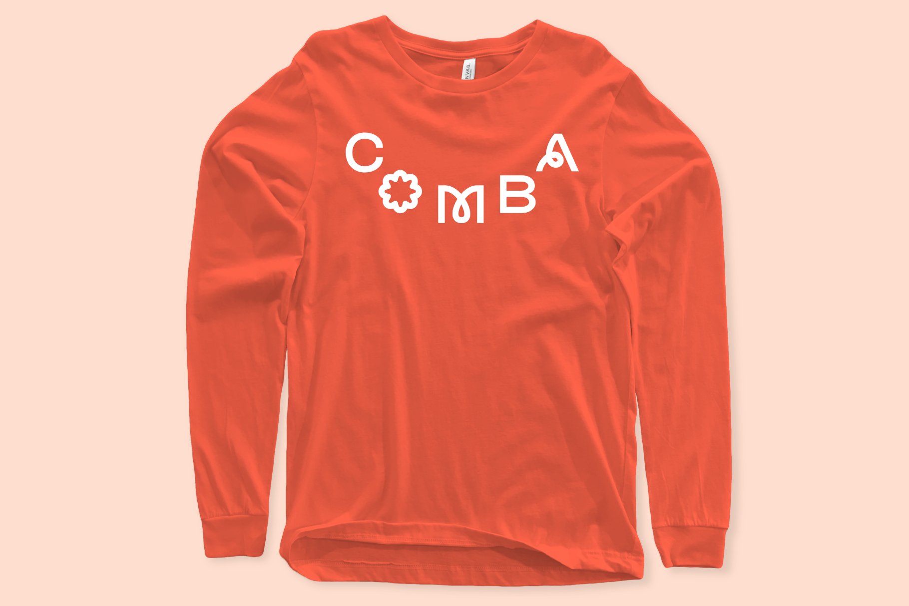 Red long-sleeve shirt mockup with stylish typography design spelling COMBA. Perfect for fashion designers and apparel branding. Template resource.