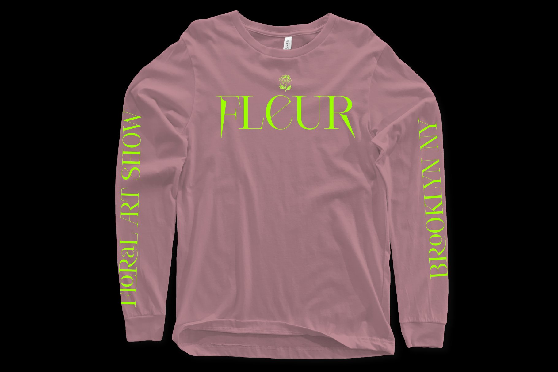 Long sleeve pink shirt with neon green Fleur typography on chest and sleeves, featuring floral art show Brooklyn NY text. Fashion template mockup.